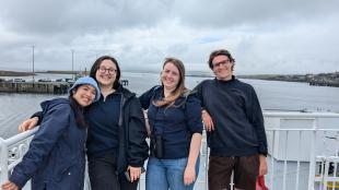 4 students on a ferry 